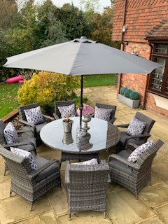 8 Savannah Armchairs 1.5mtr Round Set in Grey/Black Mix Weave with Parasol Complete